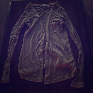 Tan long sleeve sweater.